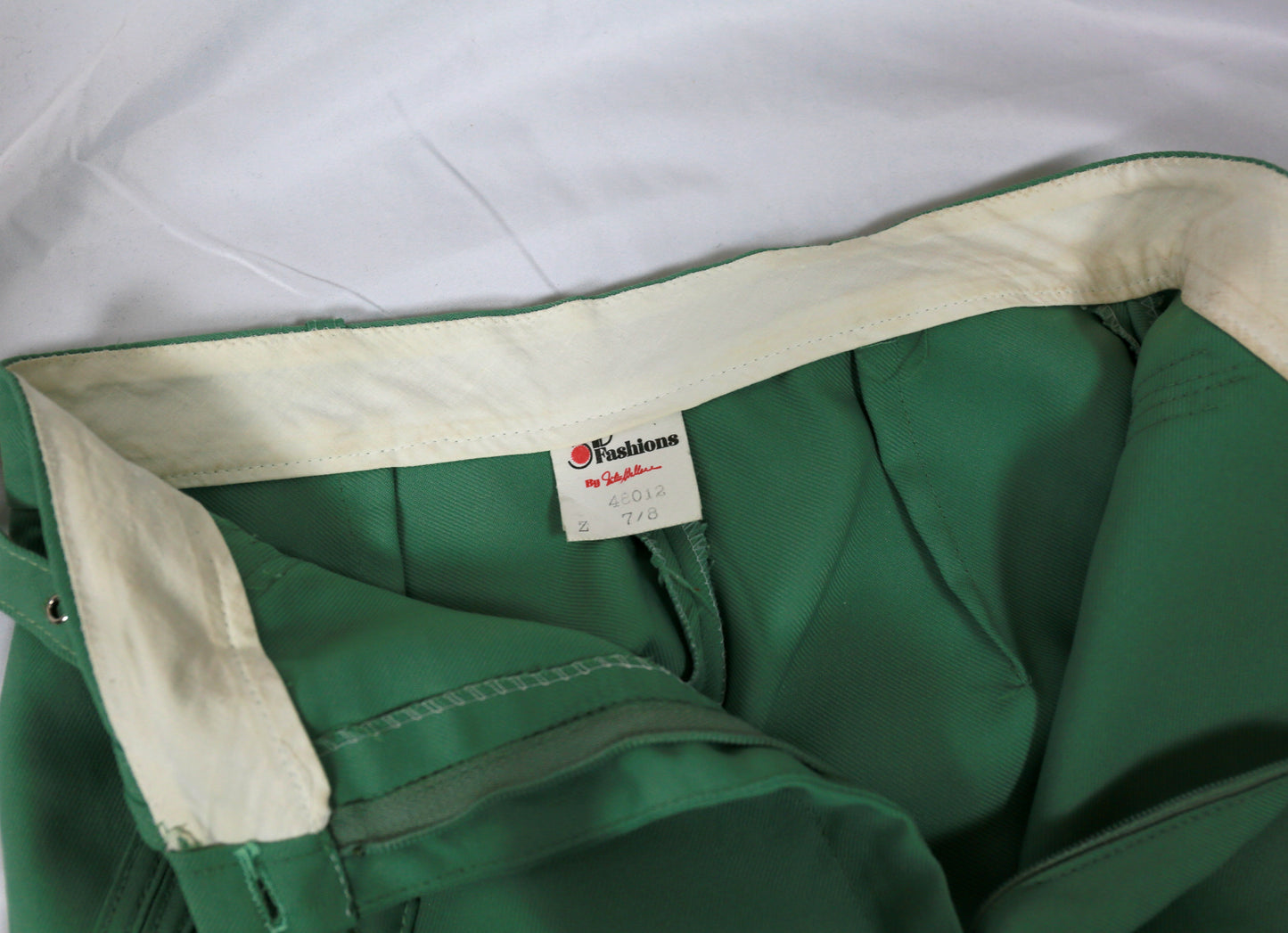 belted green trousers